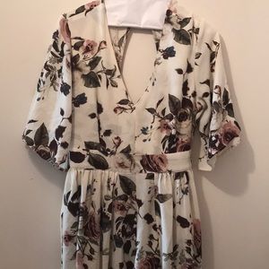 Lovely floral high low one piece!